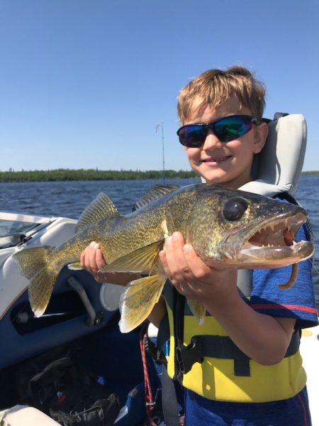 Ontario Wilderness Houseboat Boy With Walleye