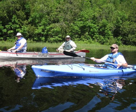 People In A Canoe And A Kayak While On Vacation Aspect Ratio 474 392