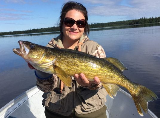 Vacationer Cta With Big Fish Caught On Northern Ontario Lake Aspect Ratio 536 397