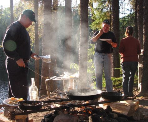 Vacationers On Holiday Having A Shore Lunch In Northern Ontario Aspect Ratio 474 392